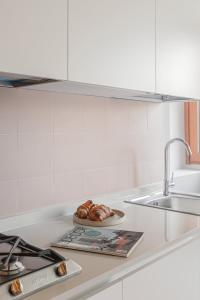 Kuchyň nebo kuchyňský kout v ubytování 4BNB - Suites del Gallo + 36 fotografií
