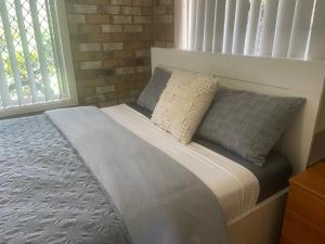 Letto o letti in una camera di Spacious studio unit
