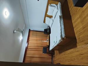 Giường trong phòng chung tại Hotel Ruby and Restaurant