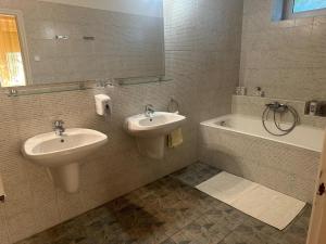 Kúpeľňa v ubytovaní Postafiók Apartman