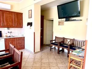 Kuchyňa alebo kuchynka v ubytovaní Postafiók Apartman