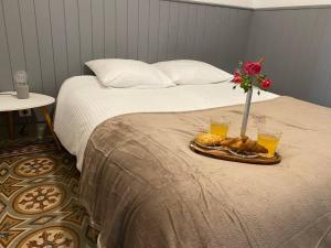 Postel nebo postele na pokoji v ubytování Le Piton - Appartements