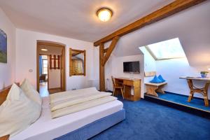 Un televizor și/sau centru de divertisment la Hotel Drei Mohren