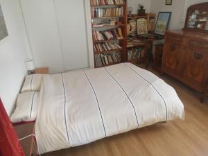 Postel nebo postele na pokoji v ubytování Maisonnette
