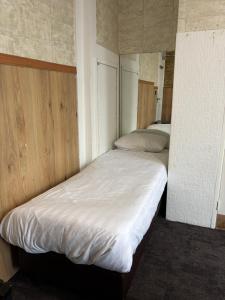 Letto o letti in una camera di Flex-Inn