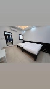 Postel nebo postele na pokoji v ubytování La Marina