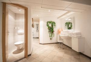 Kúpeľňa v ubytovaní Hotel Stolz