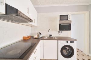 Kuchyňa alebo kuchynka v ubytovaní Fantástico apartamento junto a la estación