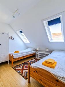 Postel nebo postele na pokoji v ubytování Nordlicht