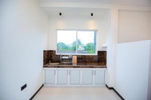 Dapur atau dapur kecil di Opulent Oasis