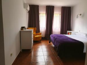 Postel nebo postele na pokoji v ubytování El Rincón de la ESPE