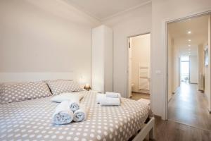 A bed or beds in a room at B&B Panorama Iseo