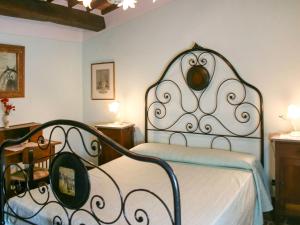 Posteľ alebo postele v izbe v ubytovaní Holiday Home A spasso tra gli ulivi by Interhome + 37 fotografií