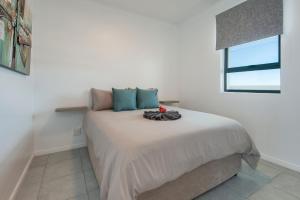 Ένα ή περισσότερα κρεβάτια σε δωμάτιο στο Perlemoen Apartments