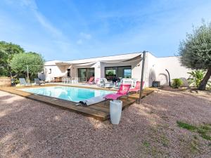 een huis met een zwembad en een tent bij Villa Villa Lamas by Interhome in Sainte-Lucie de Porto-Vecchio
