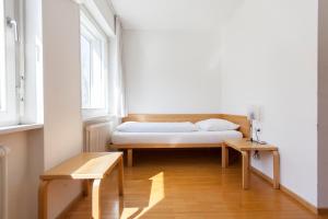 Letto o letti in una camera di Bildungshaus Arbogast