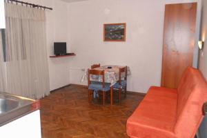 TV a/nebo společenská místnost v ubytování Apartments Ivo
