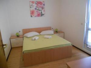 Postel nebo postele na pokoji v ubytování Apartments Ivo