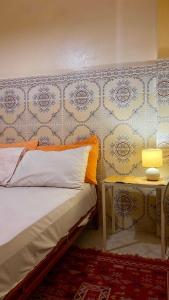 Voodi või voodid majutusasutuse Dar Relax Hostel, Gorges de Todra toas