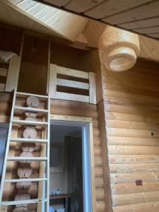 a teddy bear on a shelf in a room at Voronins Retreat House in Lumshory +39 photos
