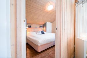 Voodi või voodid majutusasutuse Objekte im Umland Hof Ruhleben - Haus Fischerfreunde toas