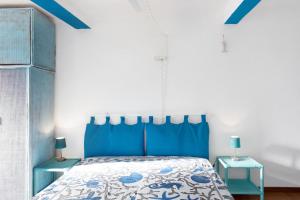 Ένα ή περισσότερα κρεβάτια σε δωμάτιο στο Casa Monica