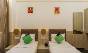 Postel nebo postele na pokoji v ubytování Itsy Hotels Silver Keys