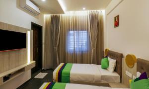 Postel nebo postele na pokoji v ubytování Itsy Hotels Silver Keys