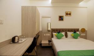 Postel nebo postele na pokoji v ubytování Itsy Hotels Silver Keys