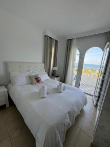 Postel nebo postele na pokoji v ubytování Aldea beach, manilva