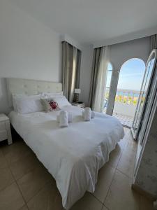 Postel nebo postele na pokoji v ubytování Aldea beach, manilva