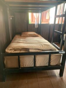 Postel nebo postele na pokoji v ubytování KK House