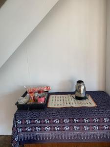 Postel nebo postele na pokoji v ubytování KK House