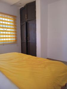 Postel nebo postele na pokoji v ubytování 501 Aparthotel