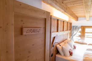 Letto o letti in una camera di Chalet Al Maso Val Calamento