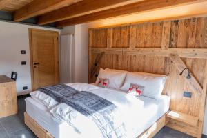 Letto o letti in una camera di Chalet Al Maso Val Calamento