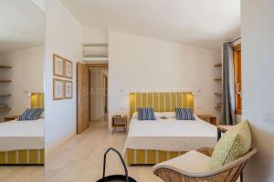 Ένα ή περισσότερα κρεβάτια σε δωμάτιο στο Villa Jaqueline +52 φωτογραφίες
