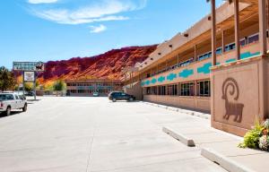 an empty parking lot in front of a building at Big Horn Lodge in Moab