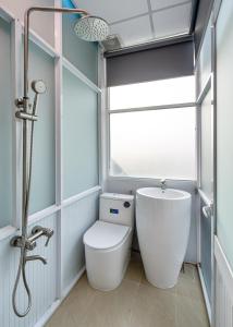 Koupelna v ubytování Hoàng Quỳnh Hotel