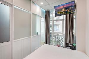 Postel nebo postele na pokoji v ubytování Hoàng Quỳnh Hotel
