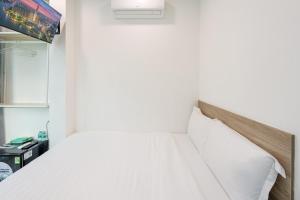 Postel nebo postele na pokoji v ubytování Hoàng Quỳnh Hotel