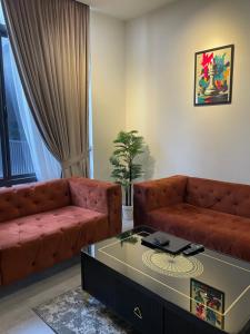 Posezení v ubytování SkyPark One Penthouse- Gulberg Green Islamabad