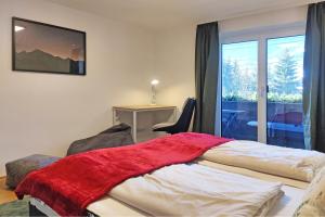 Letto o letti in una camera di NA-Home Kitzbühel