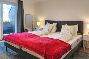 Letto o letti in una camera di NA-Home Kitzbühel