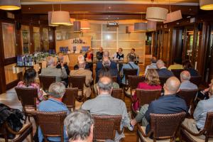 a group of people sitting in chairs in a room at Mariva Dune Suites in San Vincenzo +57 photos