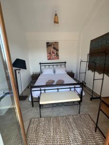 Postel nebo postele na pokoji v ubytování ManiSpot BP + 24 fotografií