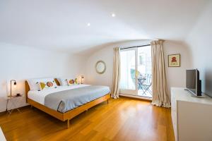 Postel nebo postele na pokoji v ubytování Direlo Guest House - Dépendance