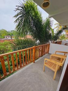 A balcony or terrace at Sun Rest Mirissa