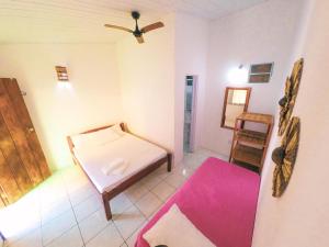 Postel nebo postele na pokoji v ubytování Buddy's Hostel Itacaré