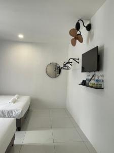 TV o dispositivi per l'intrattenimento presso TDOZE Hotel